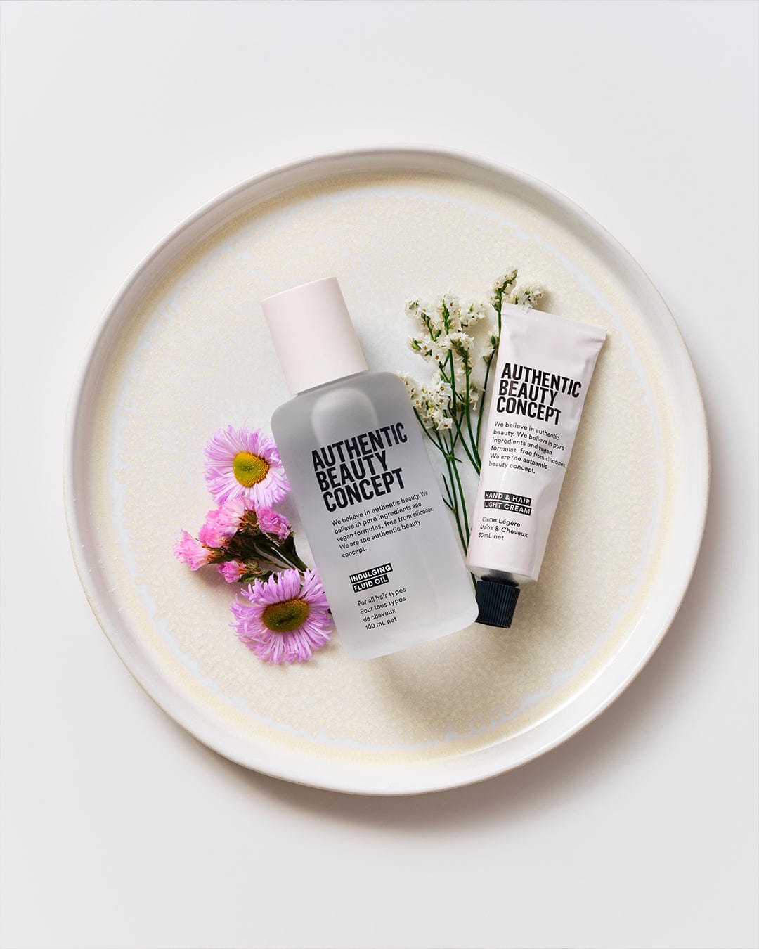 Authentic Beauty Concept Aceite Capilar INDULGING FLUID OIL Aceite de Cuidado Fluido 100ml Roberta Beauty Club Tienda Online Productos de Peluqueria